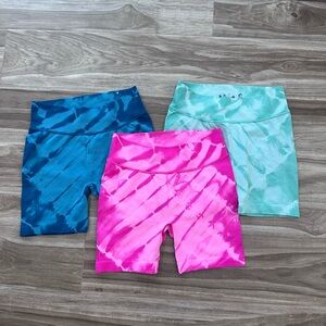 New never worn 3 pairs of stretchy biker shorts. Green, blue and pink!